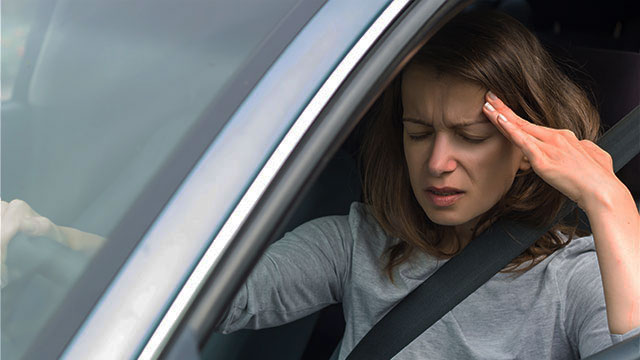 pateint with headache needing auto accident chiropractor in Tarrytown