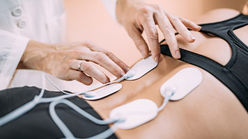 electrical muscle stimulation for auto accident injury treatment in Tarrytown